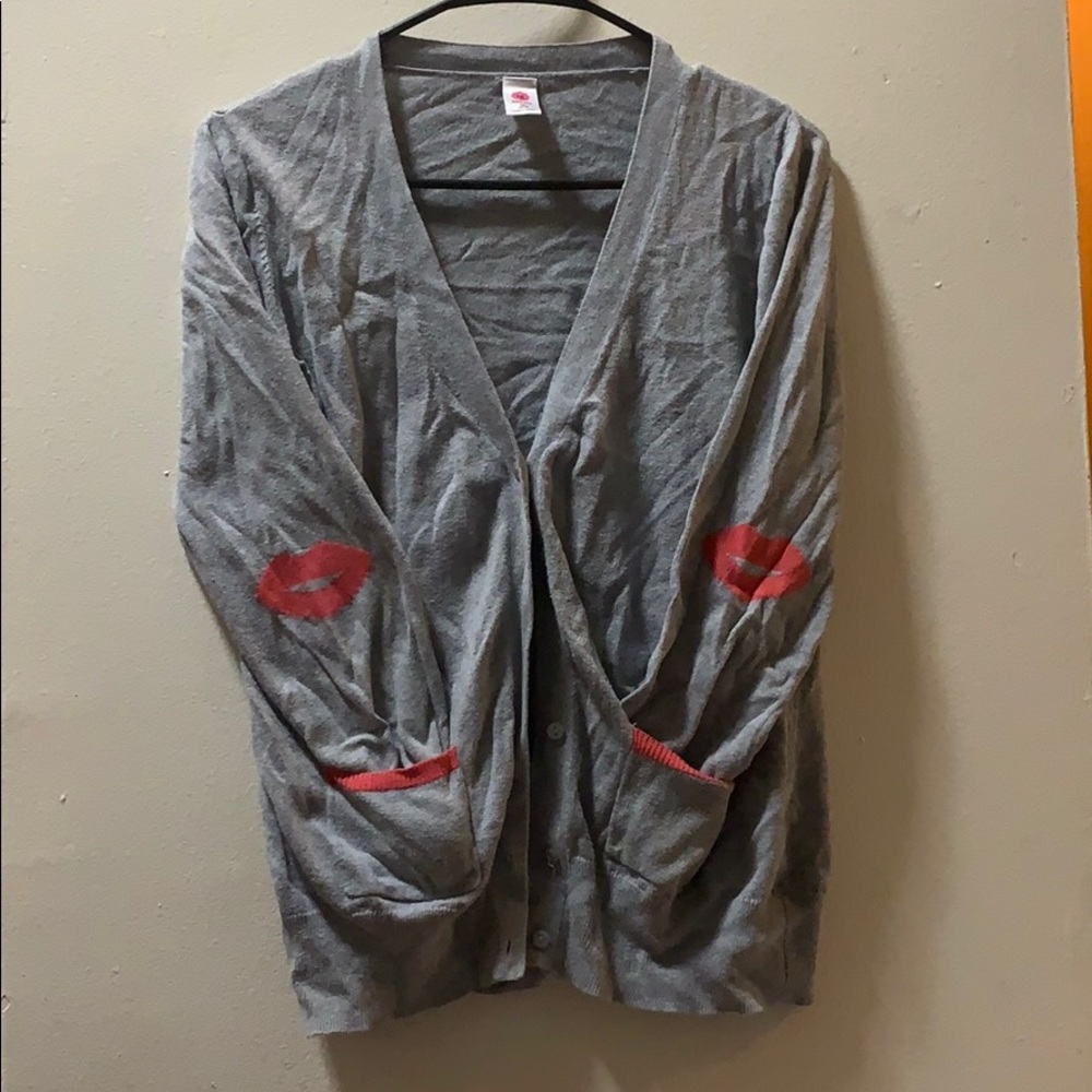 Gray sweater with kisses on them.